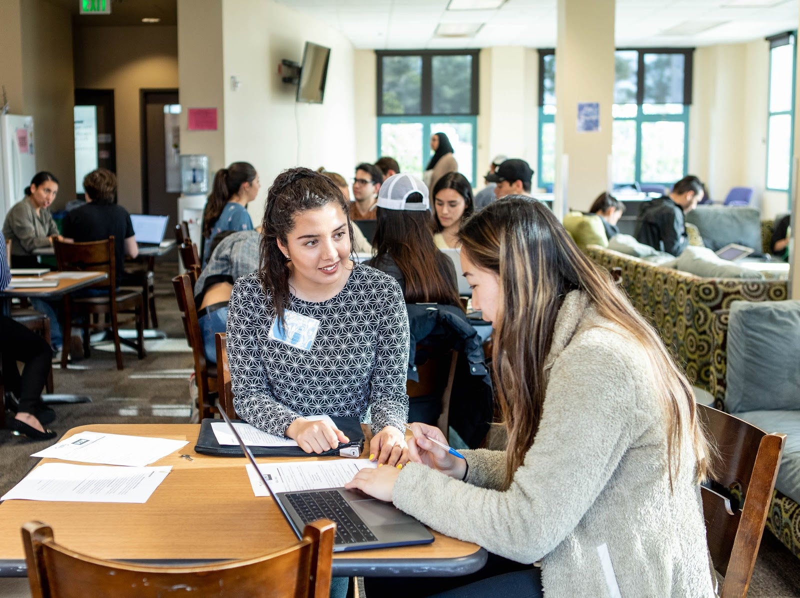 An image of Two Women Working on a CalFresh Application