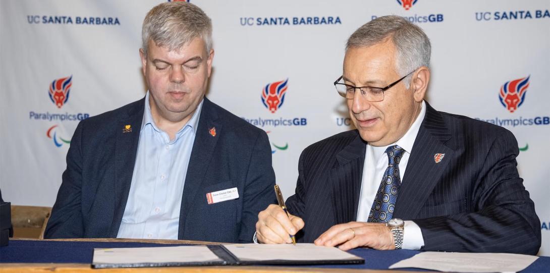 ParalympicsGB Chief Executive Officer David Clarke and UC Santa Barbara Chancellor Dennis Assanis sign a contract